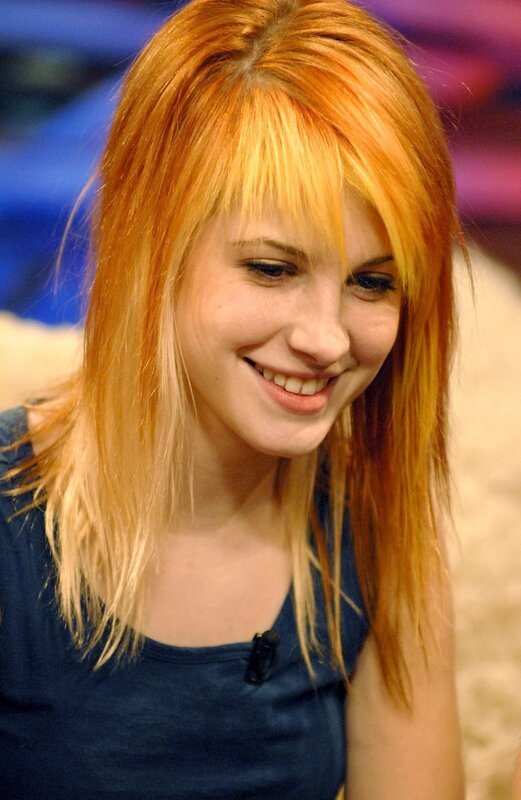 woman with red hair smiling