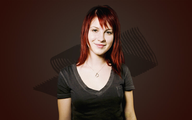 woman with red hair smiling