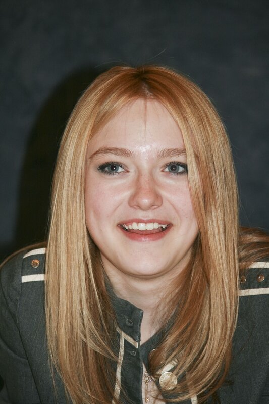 woman with red hair smiling