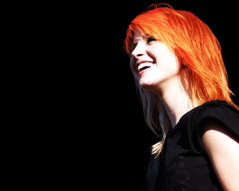 woman with red hair smiling