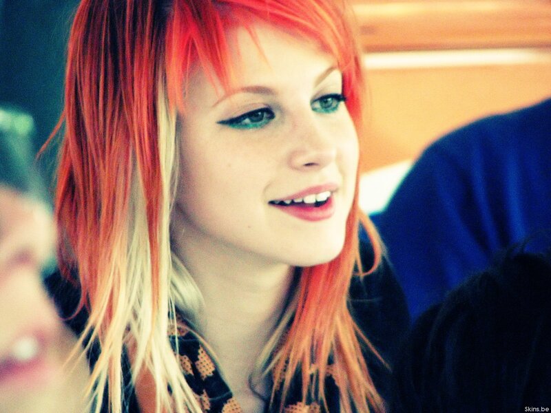 woman with red hair smiling
