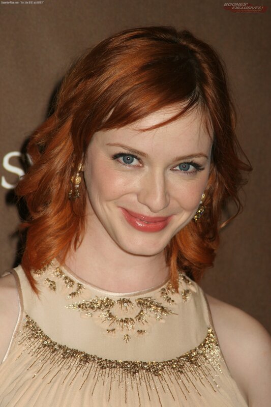 woman with red hair smiling