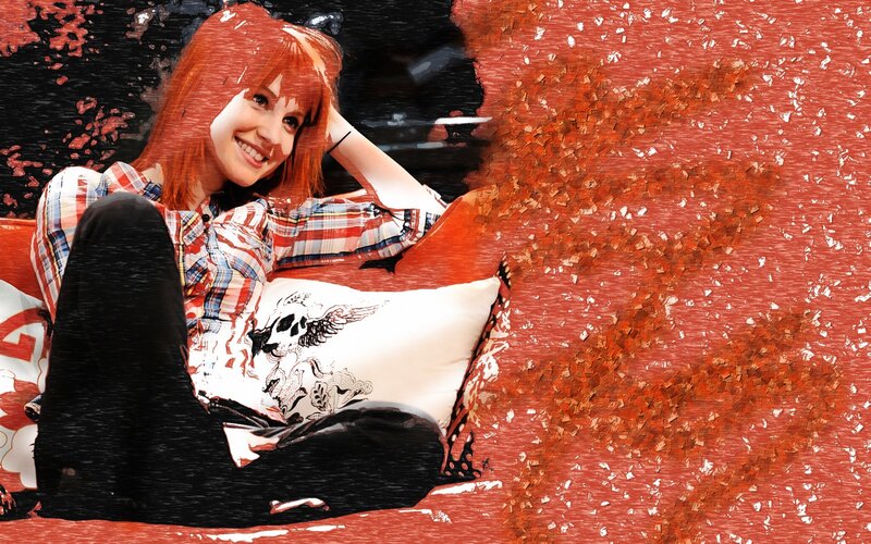 woman with red hair smiling