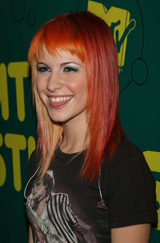 woman with red hair smiling
