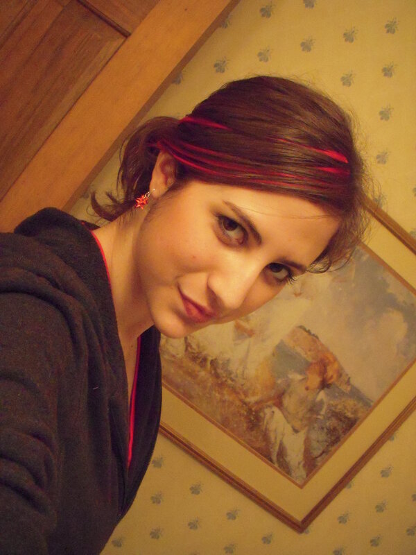 woman with red hair streaks