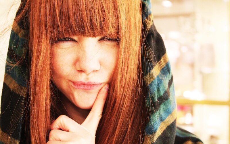 Woman with Red Hair — Thoughtful