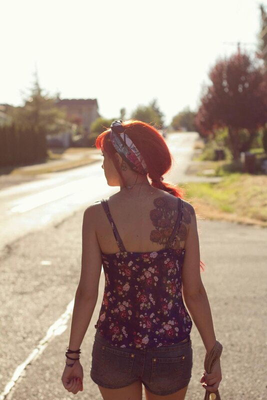 woman with red hair walking