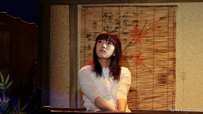 Woman with Red Hair — White, Contemplative