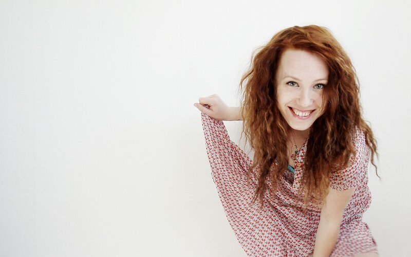 Woman with Red Hair — White, Happy, Photograph
