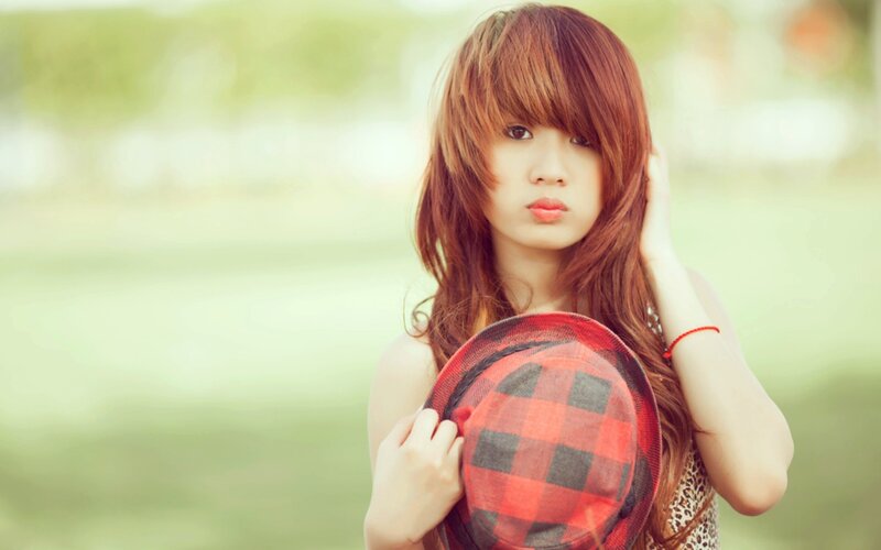 woman with red hat outdoors