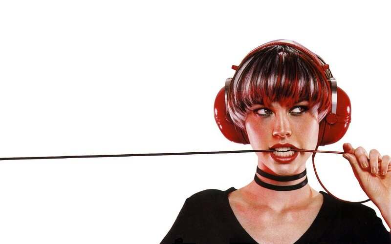 woman with red headphones
