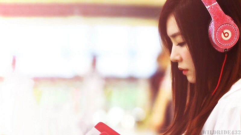 woman with red headphones