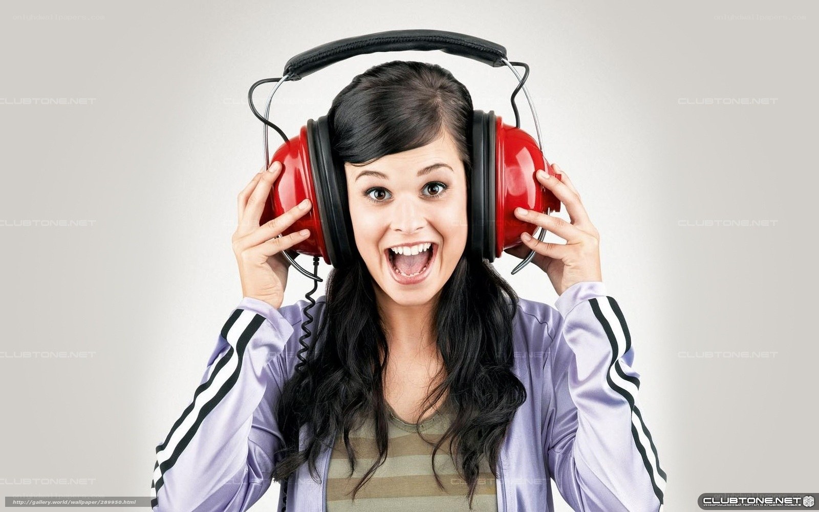 woman with red headphones