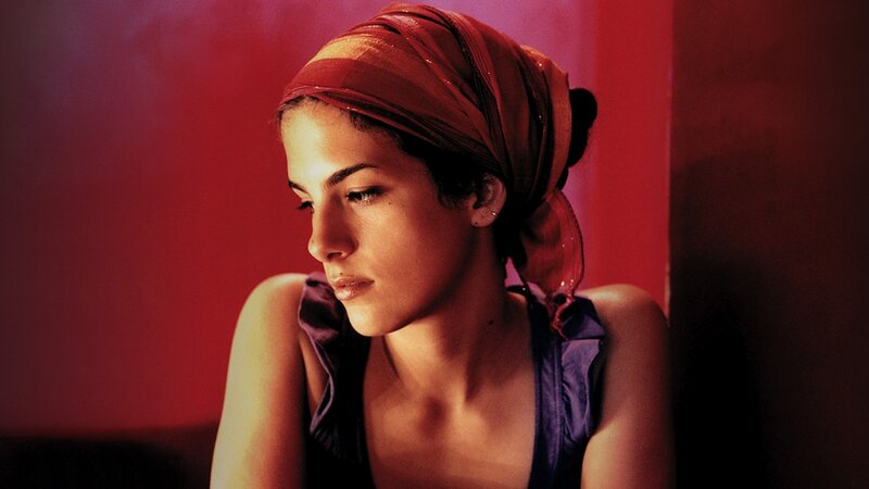 woman with red headscarf
