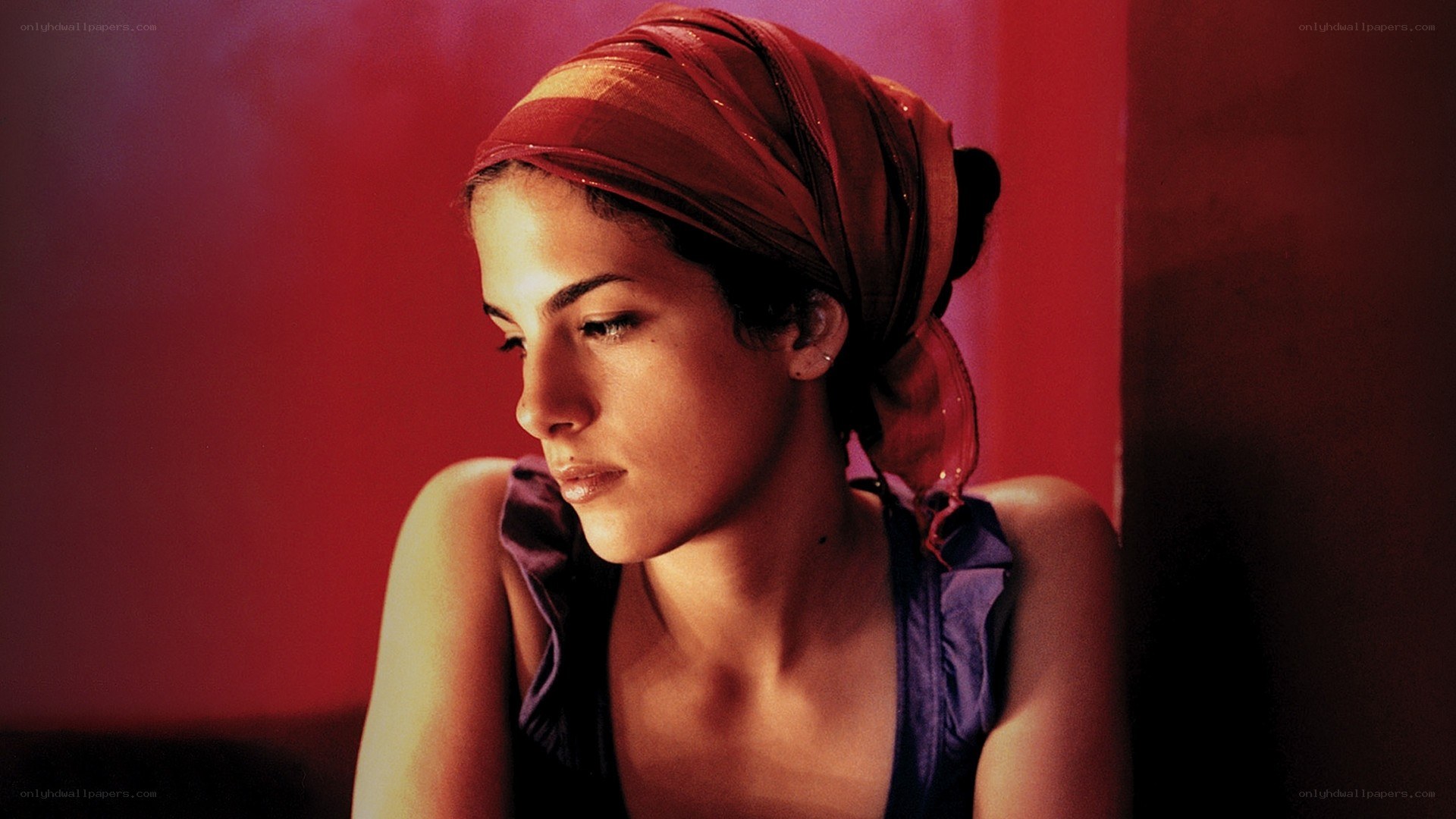 woman with red headscarf