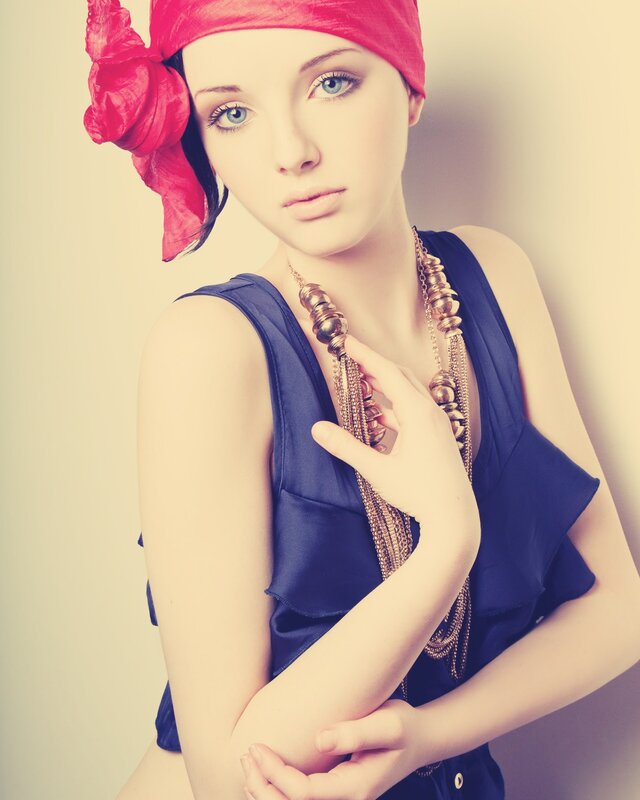 woman with red headscarf