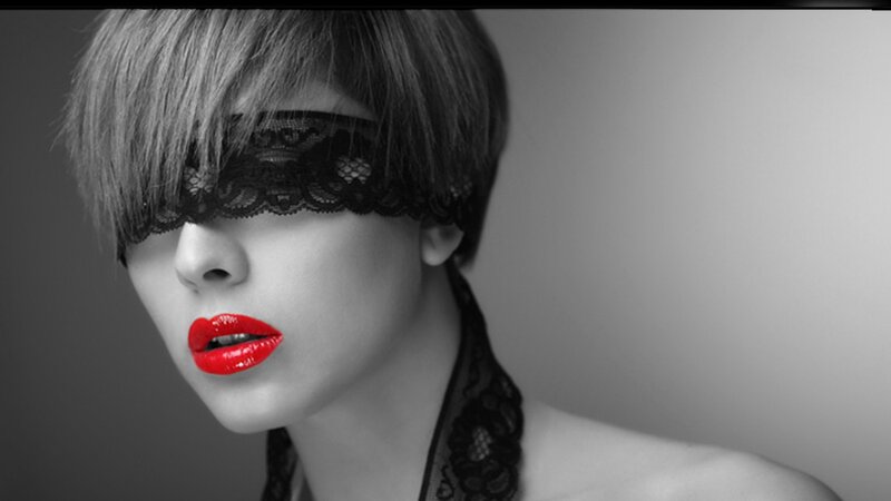 woman with red lips and blindfold