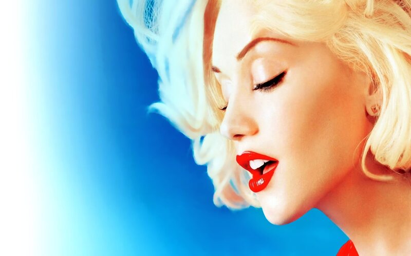 woman with red lips and blonde hair