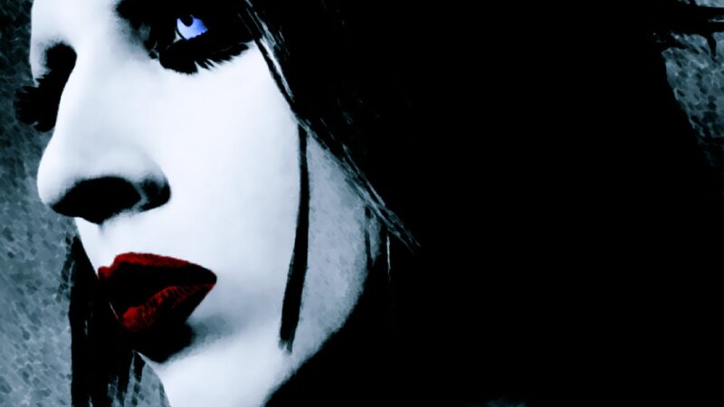 woman with red lips and blue eyes