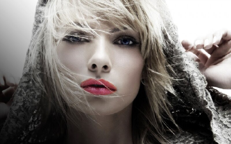 woman with red lips and blue eyes