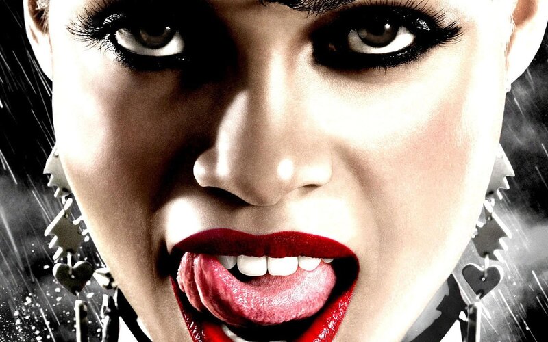 woman with red lips and dark eyes