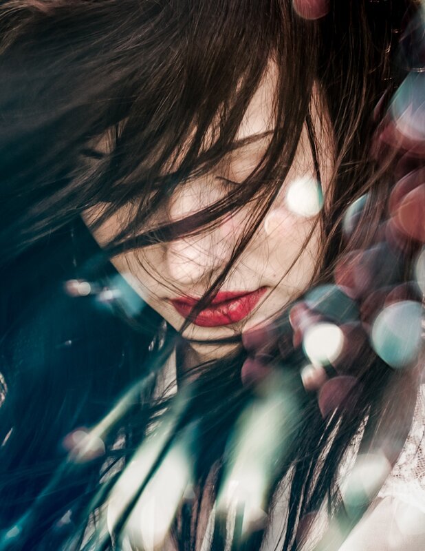 woman with red lips and dark hair