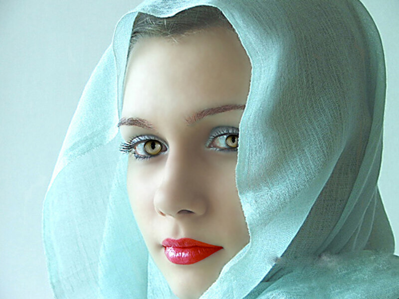 woman with red lips and headscarf