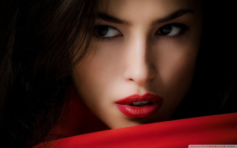 woman with red lips and scarf