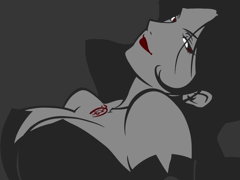 woman with red lips and tattoo