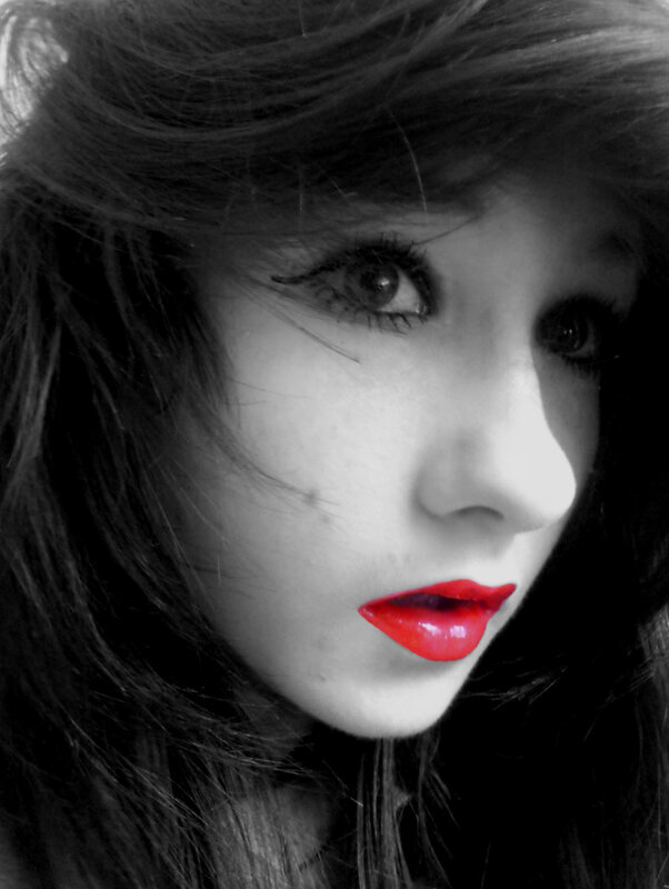 woman with red lips in black and white