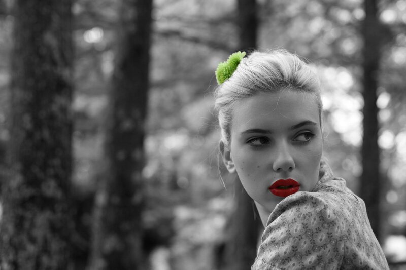 woman with red lips in forest