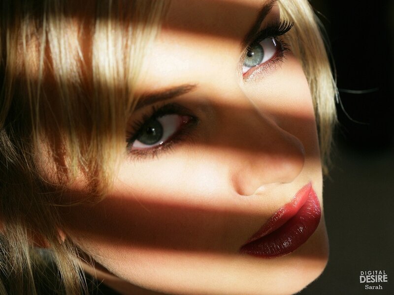 woman with red lips in sunlight