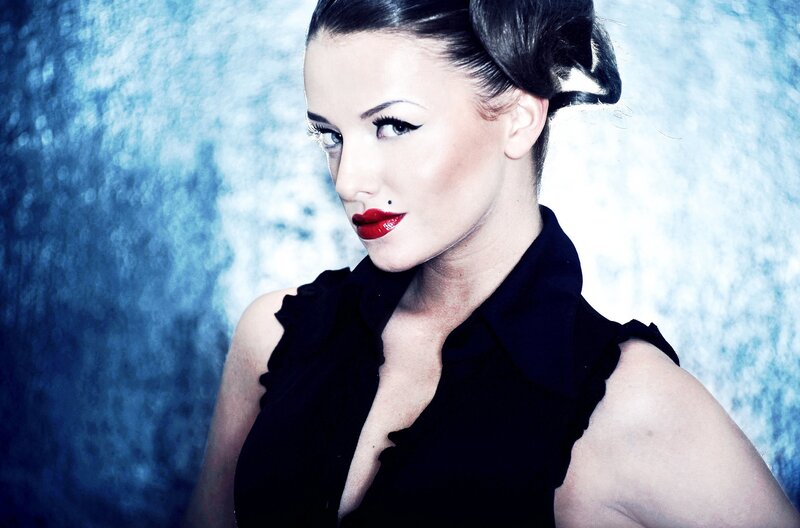 woman with red lipstick and black dress