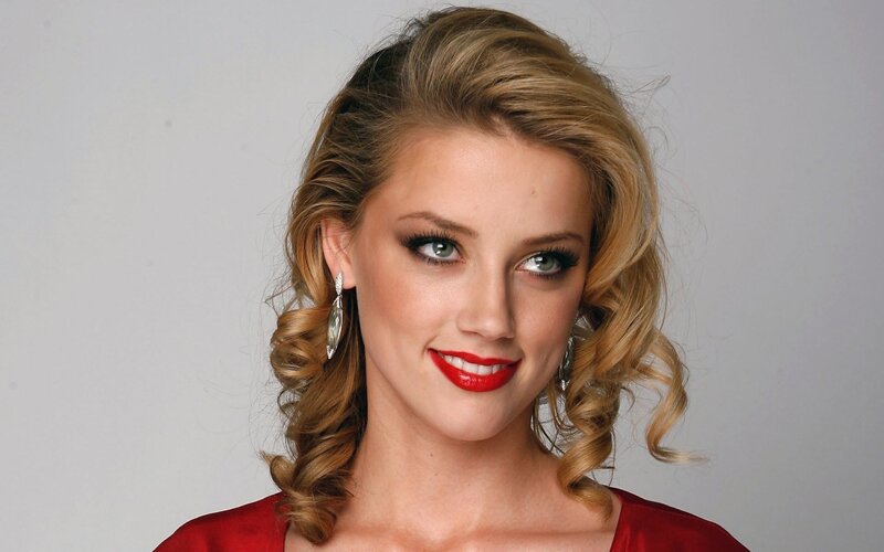 woman with red lipstick and blonde hair