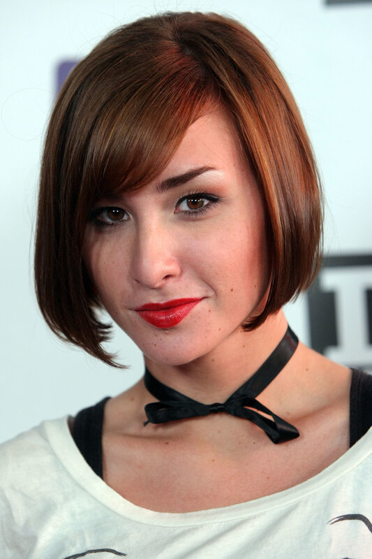 woman with red lipstick and bob haircut
