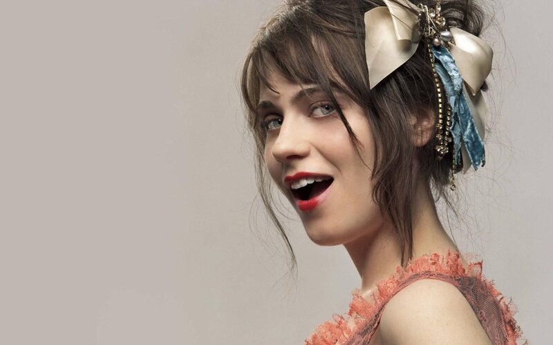 woman with red lipstick and bow