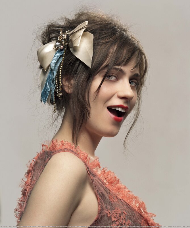 woman with red lipstick and bow