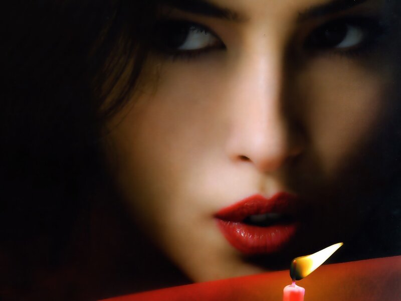 woman with red lipstick and candle