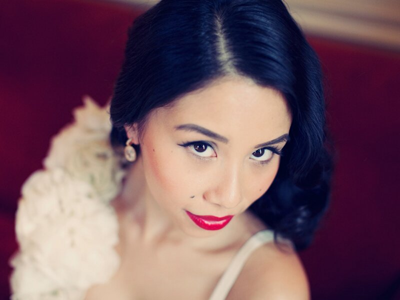 woman with red lipstick and dark hair