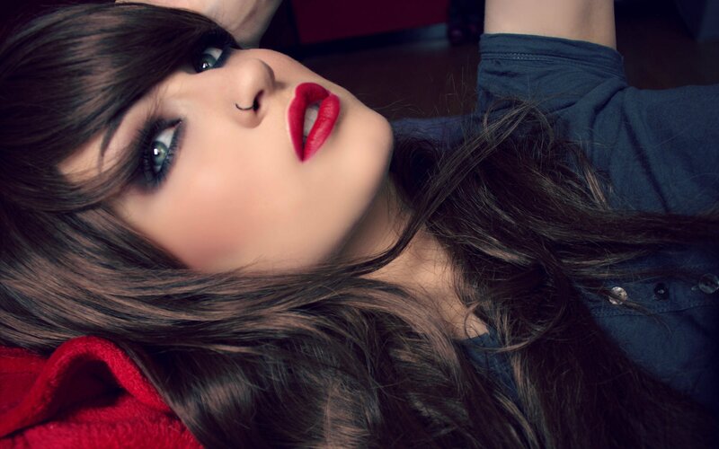 woman with red lipstick and dark hair