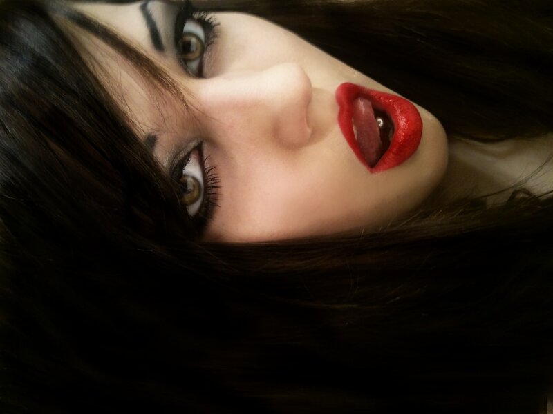 woman with red lipstick and dark hair