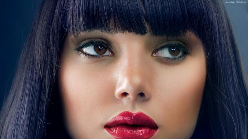 woman with red lipstick and dark hair