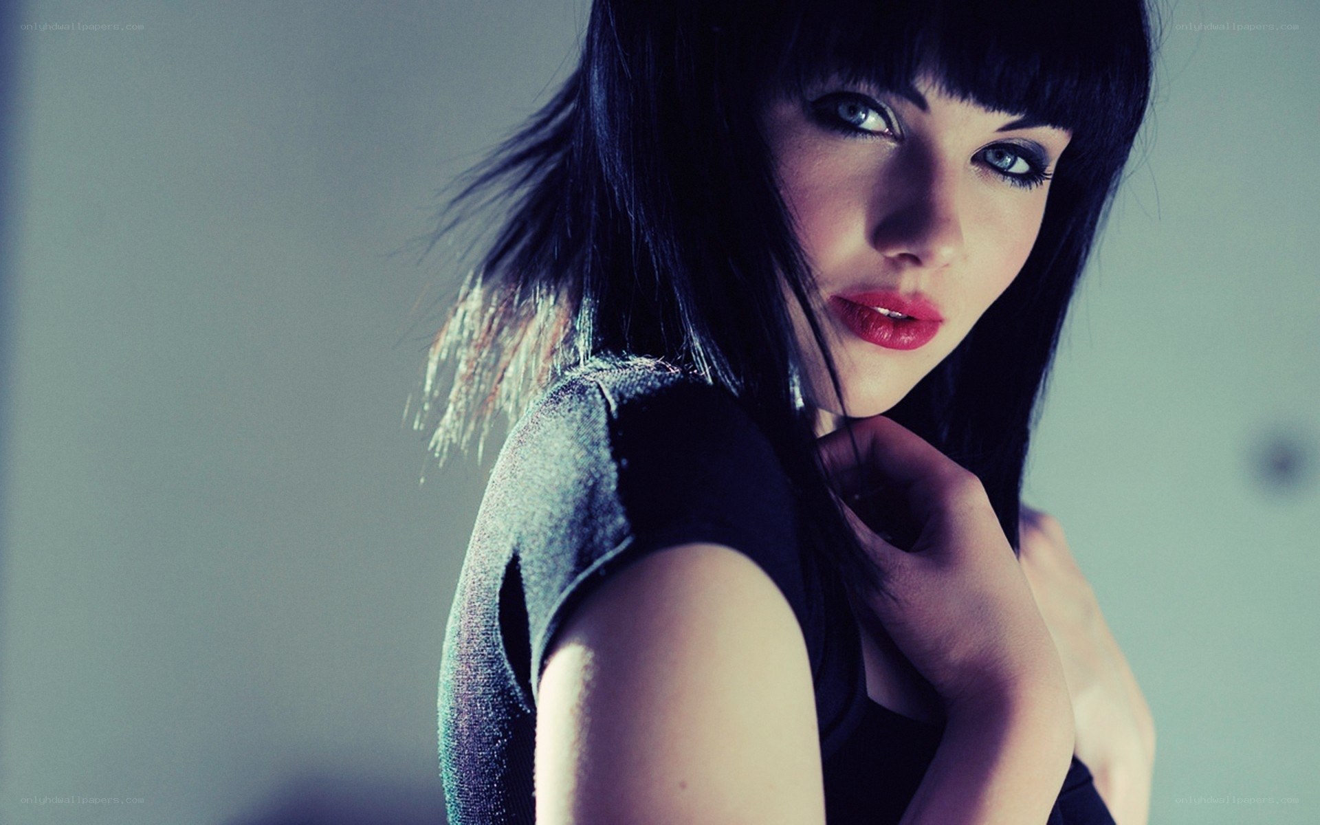 woman with red lipstick and dark hair
