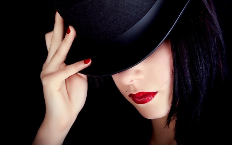 woman with red lipstick and hat