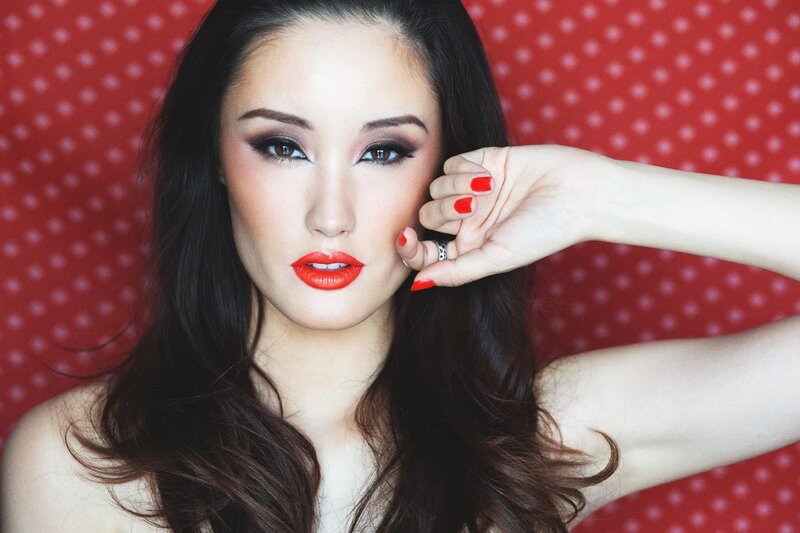woman with red lipstick and makeup