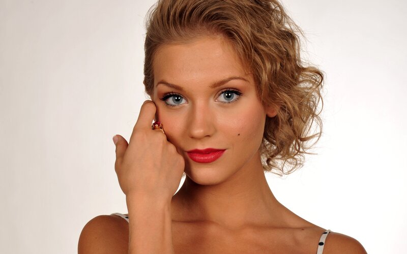 woman with red lipstick and ring