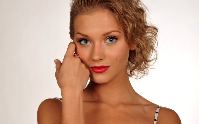 woman with red lipstick and ring
