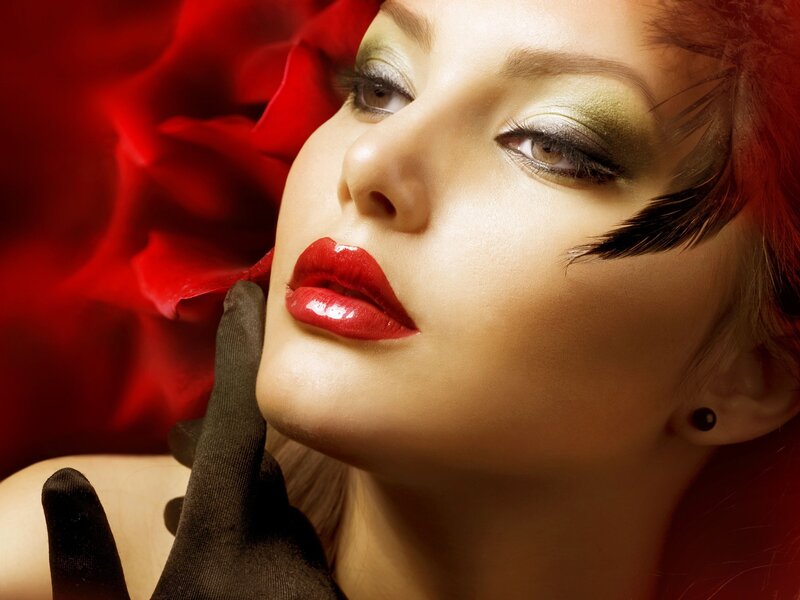 woman with red lipstick and rose