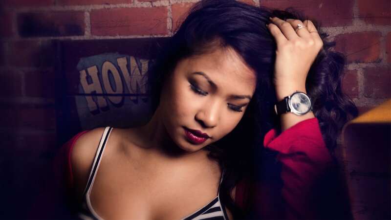 woman with red lipstick and watch