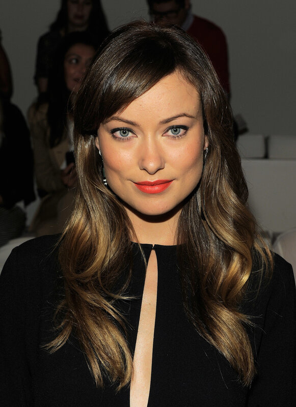 woman with red lipstick and wavy hair